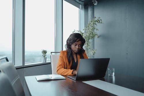 Confident finance leader working in a modern office